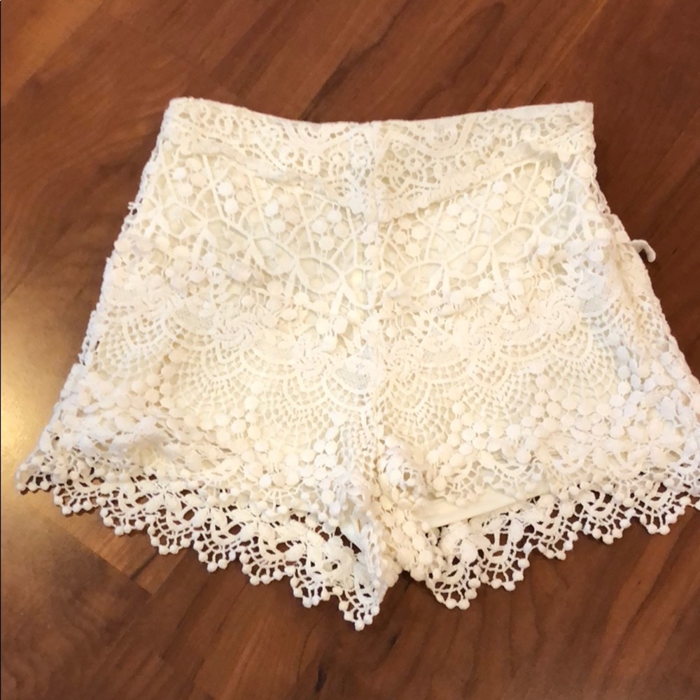 Off-white lace shorts